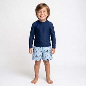 Bluey toddler boy tropical beach swim trunks featuring a palm tree print